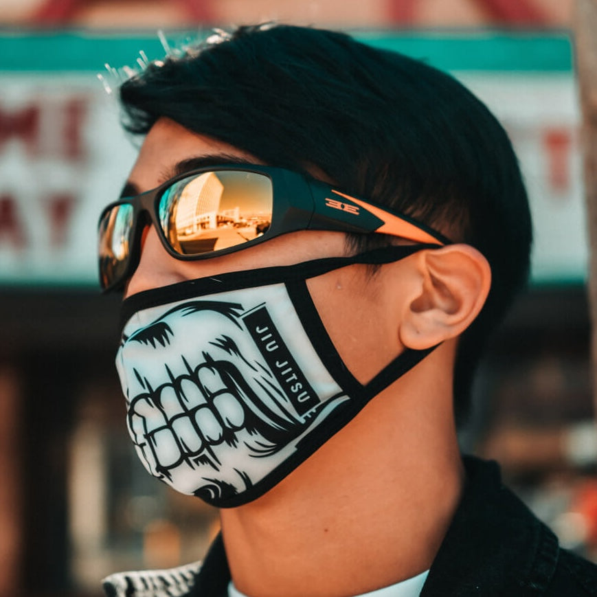 man with face mask wearing orange lens salerno