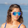 woman wearing L2 sunglasses on beach